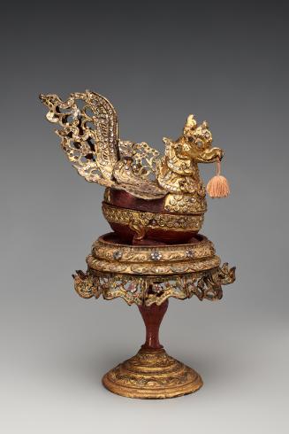 Bird-shaped betel box on stand