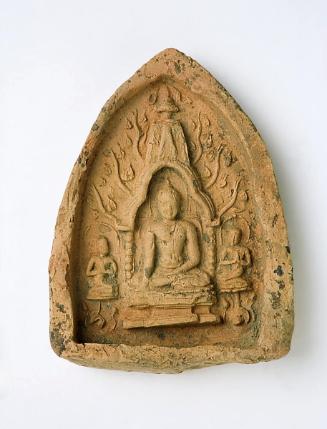 Votive tablet with seated Buddha flanked by the disciples Shariputra and Maudgalyayana