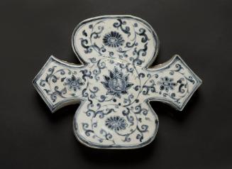 Four-lobed wall tile