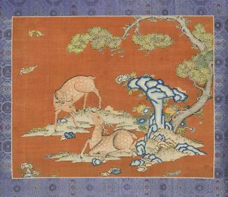 Deer under a juniper tree with bats and longevity rock