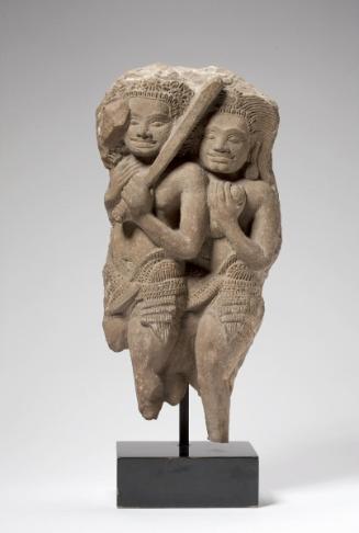 A fragment of a relief showing two warriors