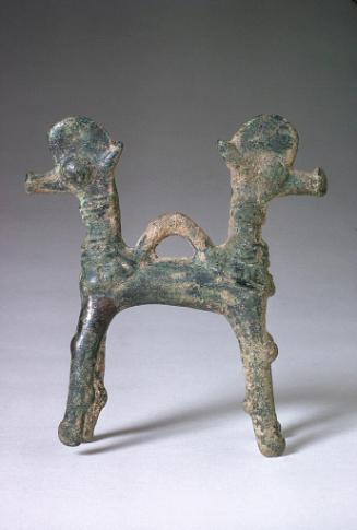 Pendant in the form of double-headed animal