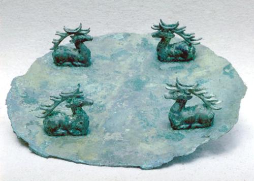 Lid with four stags