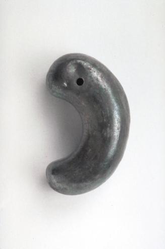 Comma-shaped jewel for a girdle (gogok)