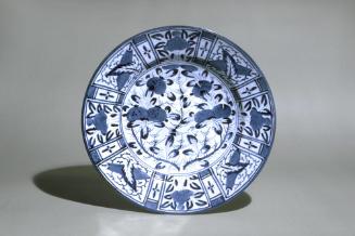 Plate with design of pomegranates