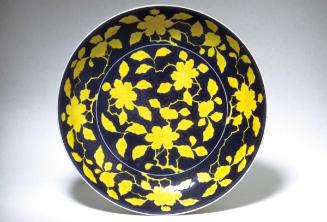 Plate with flowers, one of a pair