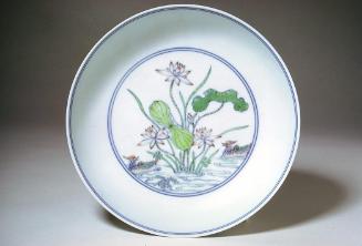 Bowl decorated with mandarin ducks and lotus, one of a pair
