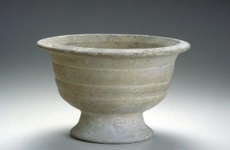 Bowl with flaring rim and foot