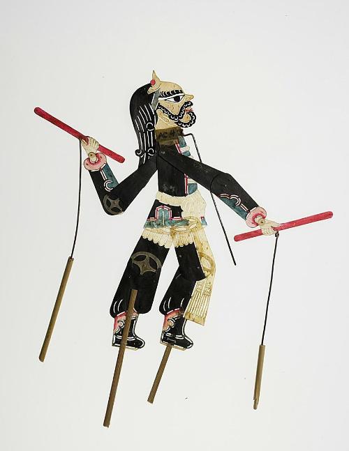 Male figure with curly hair and beard holding two red batons
