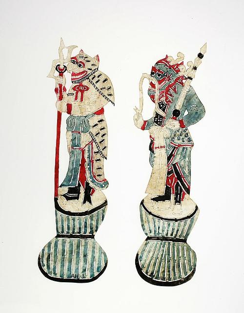 A pair of demons in blue and tiger stripes