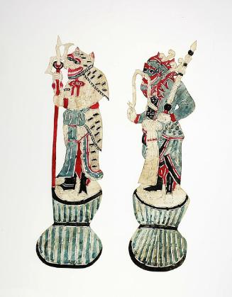 A pair of demons in blue and tiger stripes
