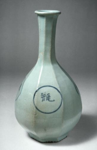 Ritual bottle with four characters