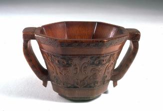 Octagonal cup in a shape of ancient bronze vessel