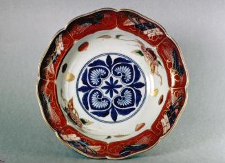 Bowl with lobed rim and decoration of chestnuts, floral motifs, and treasures