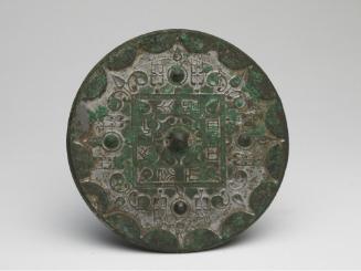 Mirror with cosmic designs and inscriptions