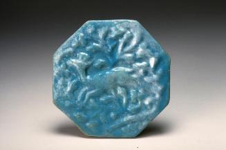 Tile with molded decoration of running deer