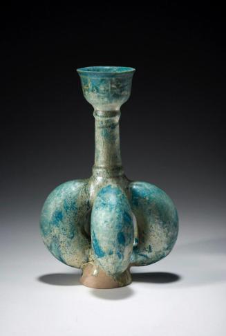 Bottle with four-lobed body

