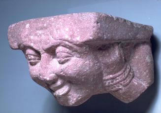 Bracket in the form of a face