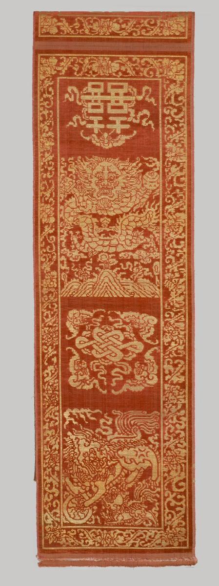 Velvet chair cover with stylized auspicious symbols
