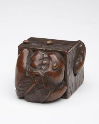 Oni (demon) hiding in footstool from pelted beans
