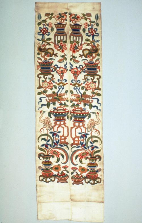 Sleeve band decorated with Three Plenties motif, one of a pair