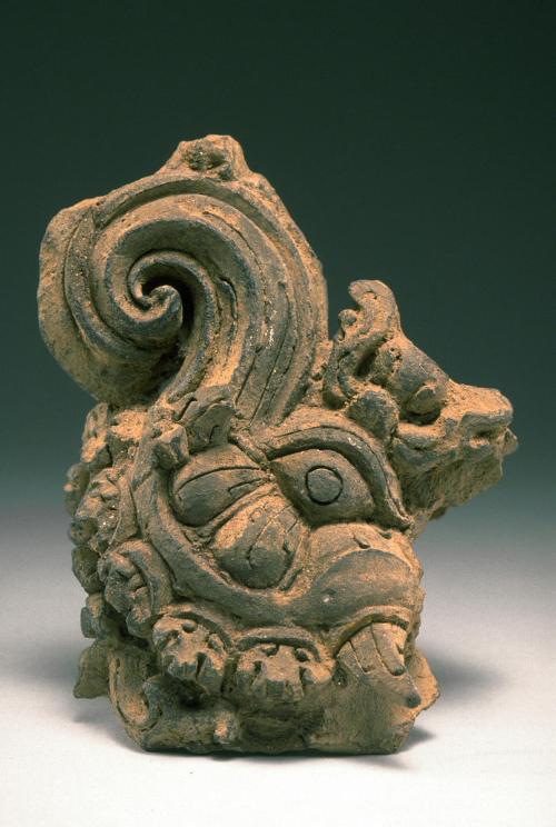 Fragment of a head of a mythical creature