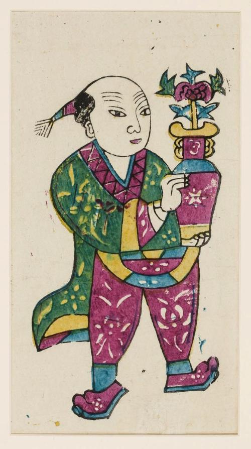 Two boys present a flower vase
