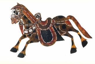 Spotted brown horse with trappings