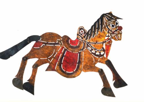 Horse with trappings