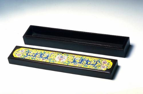 Scroll box inset with enameled panel
