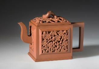 Teapot with plum blossoms in relief