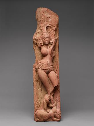 Railing pillar with female figure beneath a tree