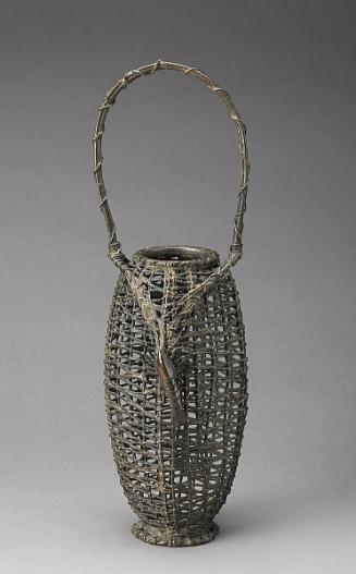 Vase in the shape of a bamboo basket