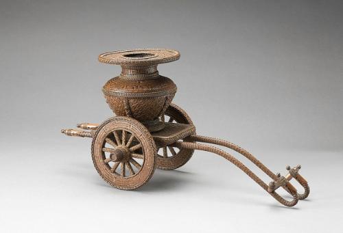 Flower basket in the shape of an ox-drawn carriage