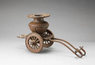 Flower basket in the shape of an ox-drawn carriage