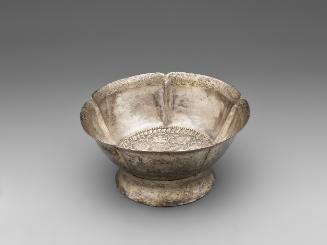 Five-lobed cup in beaten silver