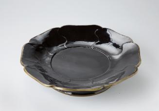Lobed dish with metal rim and high stand