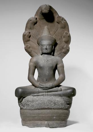 Crowned and bejeweled serpent-enthroned Buddha