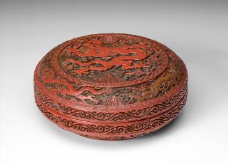 Lidded box with design of a dragon cavorting in the ocean