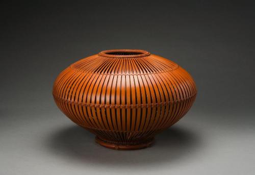 Flower basket with circular fan construction
