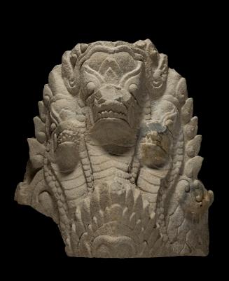 Architectural element with three-headed mythical serpent