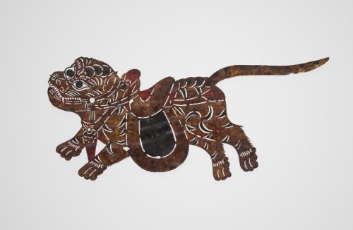 Tiger with trappings