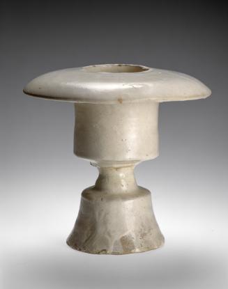 Incense-burner on a high, hollow pedestal