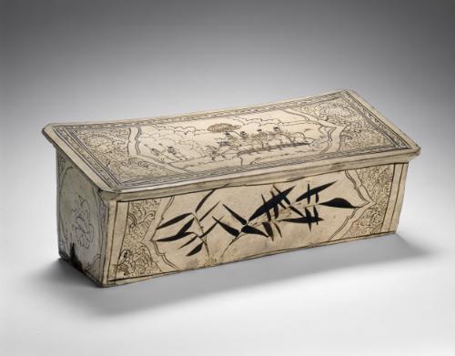 Rectangular pillow with a scene of figures in landscape