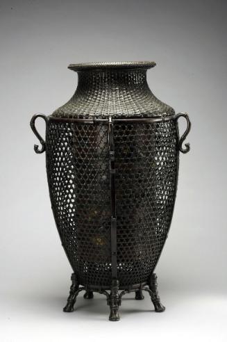 Flower container in the shape of a bamboo basket
