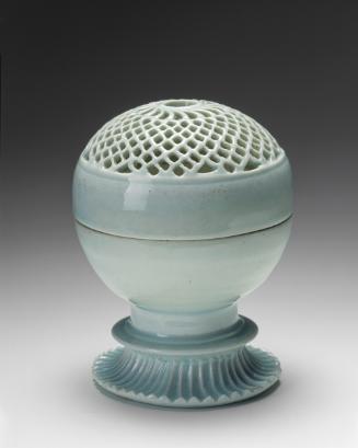 Spherical incense burner with latticed cover