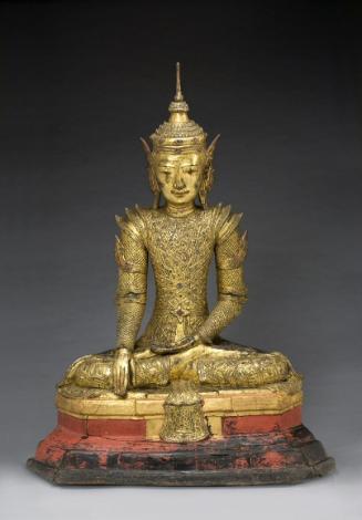 Seated crowned and bejeweled Buddha