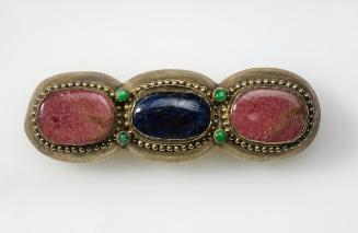 Belt buckle set with gemstones