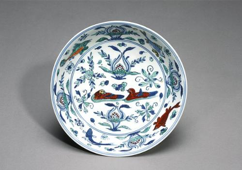 Dish with mandarin duck in lotus pond